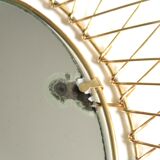 Oval golden metal sun mirror, 60s