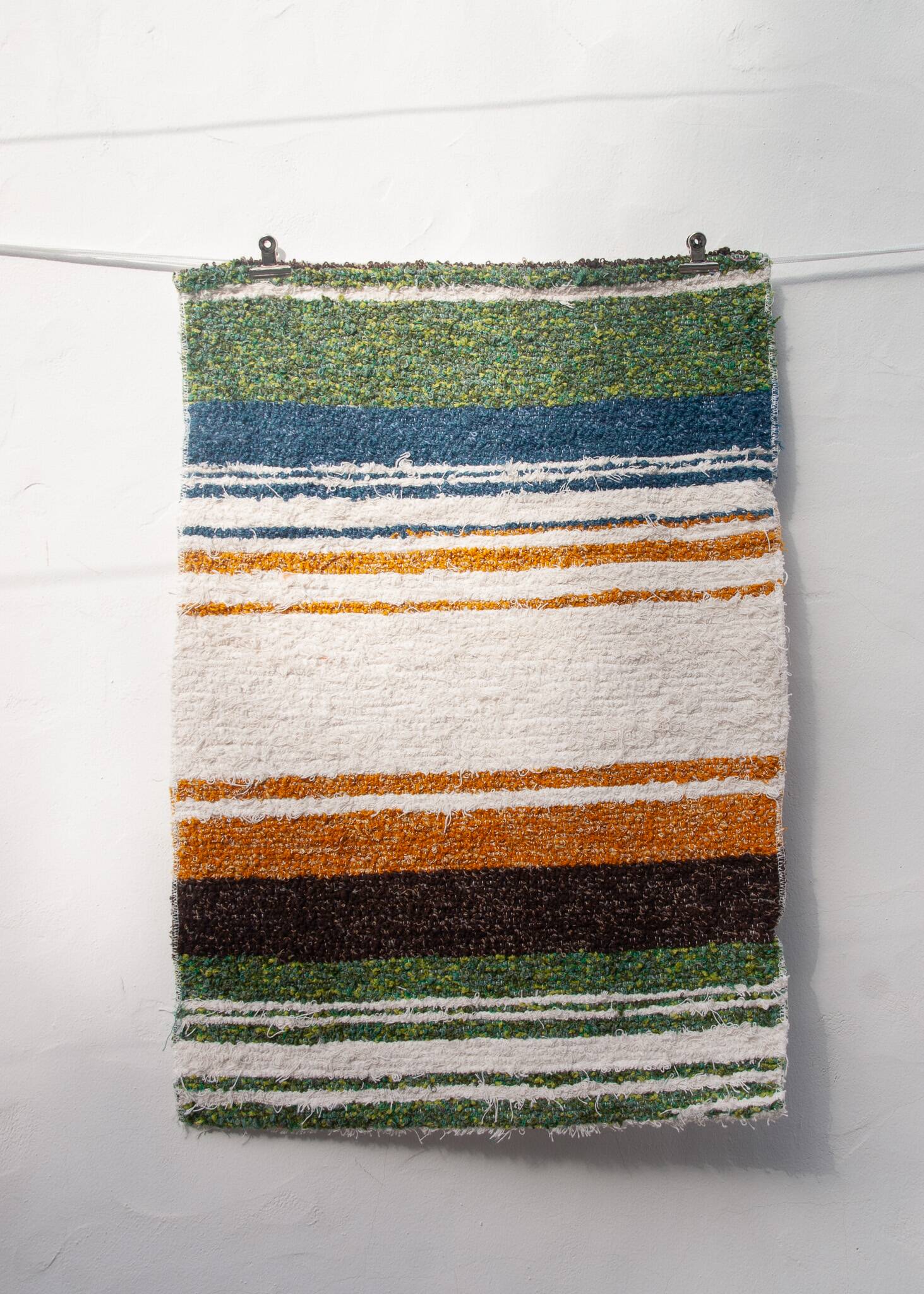 Hand-woven handmade rug made from recycled cotton