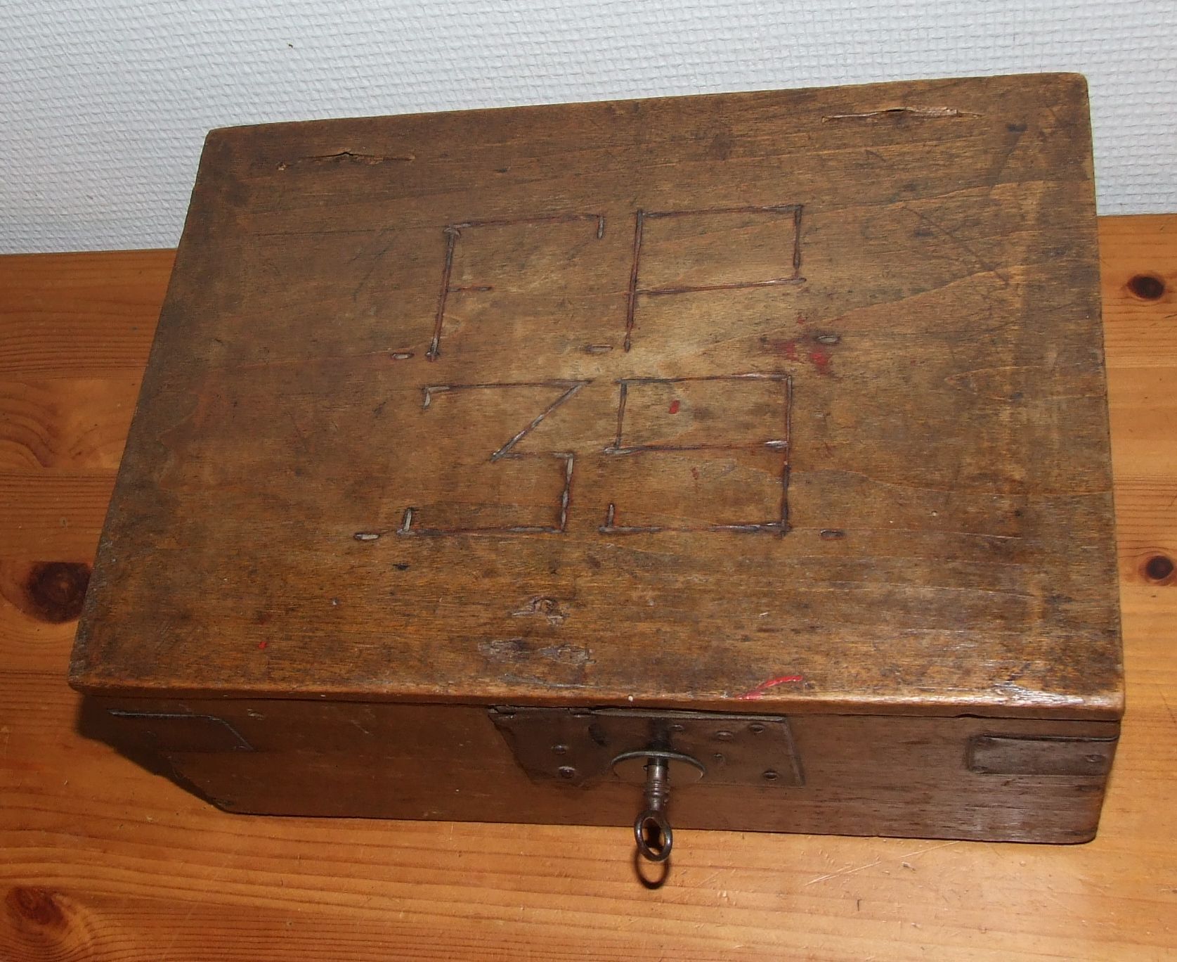 Old box with inscription, fittings, lock and key