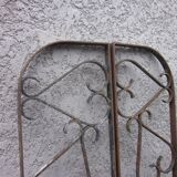 Pair of old wrought iron grid