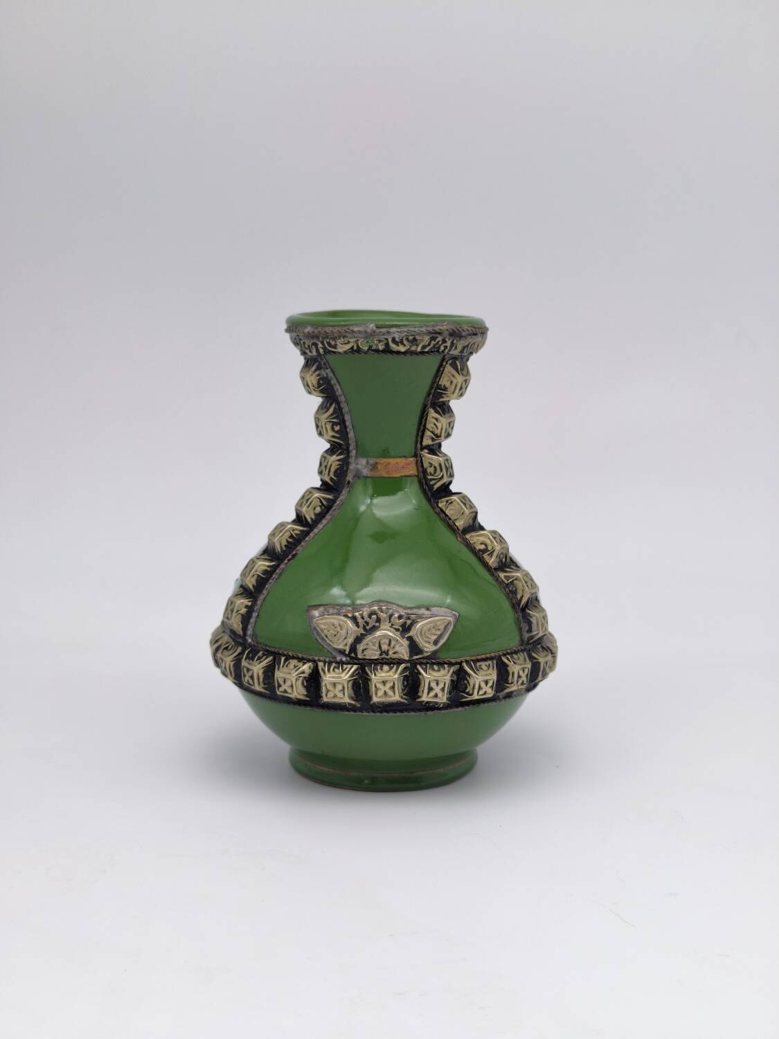 Antique green glazed ceramic vase with relief decoration – Europe