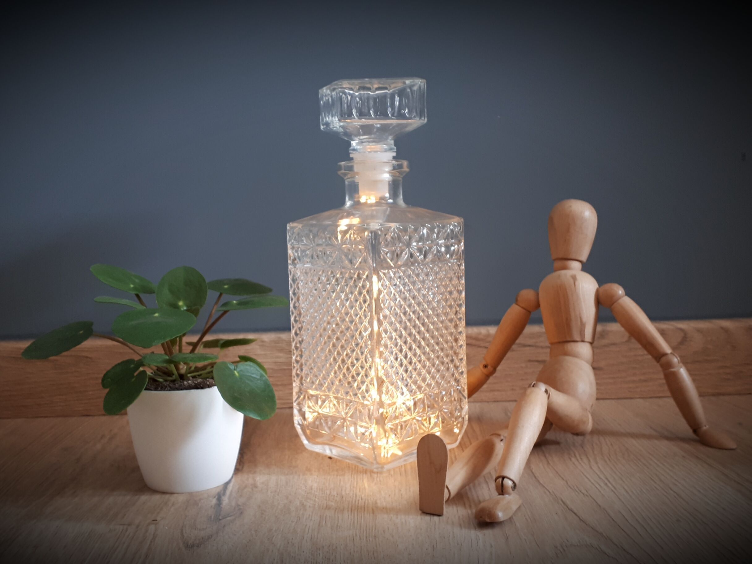 Old whisky carafe in relief glass