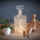 Old whisky carafe in relief glass