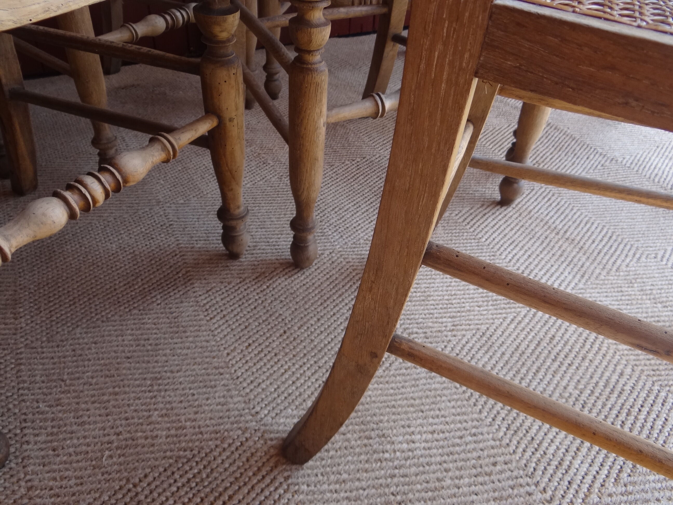 Suite of oak chairs; canated seats