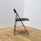 Suite of 12 folding designer chairs