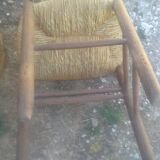 Set of five straw church chairs