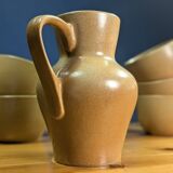 Jug and 5 cups in orange stoneware, very good condition, signed and numbered