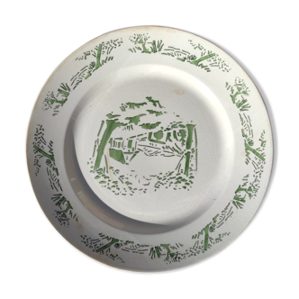 Round dish of Creil and Montereau green color with stamp and hollow mark