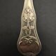 Silver dusting spoon