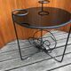1950s round coffee table in black opaline