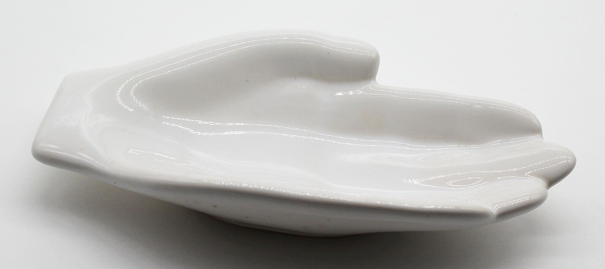 Empty white ceramic hand pocket