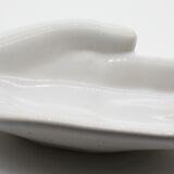 Empty white ceramic hand pocket