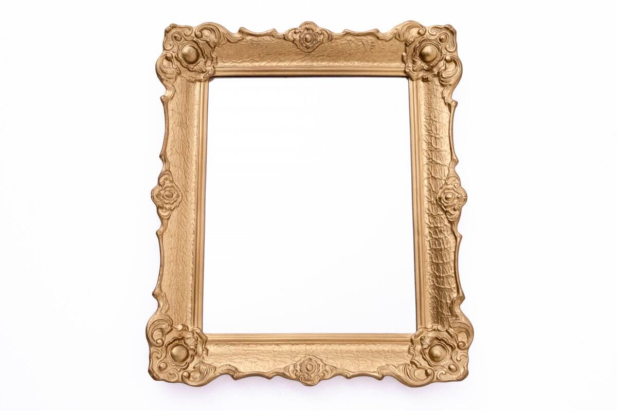 Mirror in a decorative gold frame