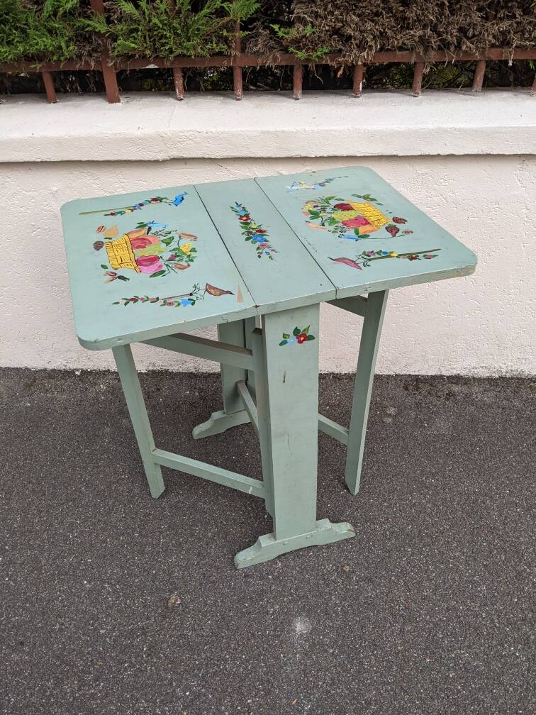 Antique Scandinavian table with bohemian country decor and hand-painted decor