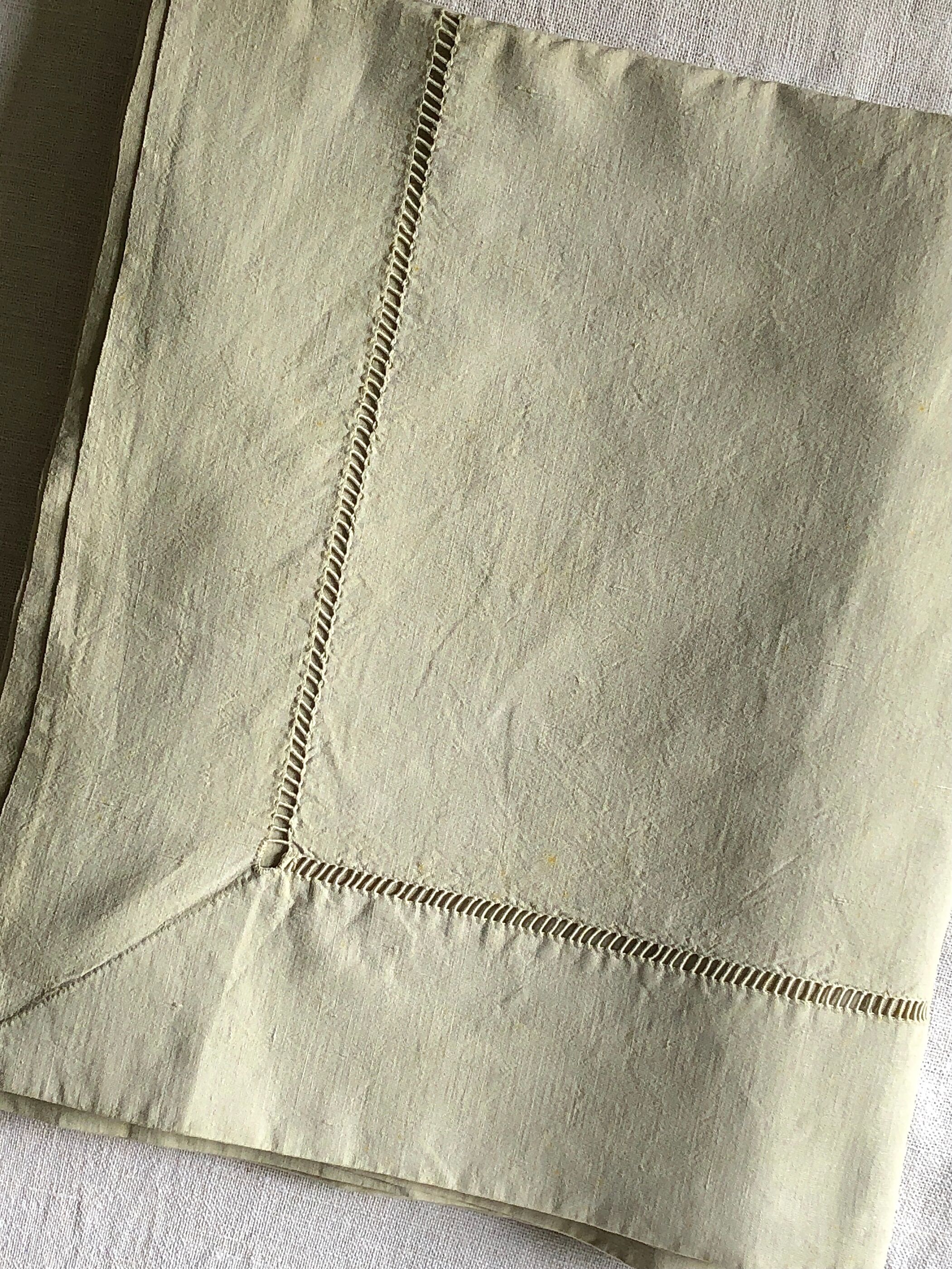 Old linen and cotton sheet tinted in linden