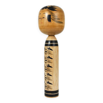 Decorative Togatta Kokeshi doll sculpture from northern Japan, hand-painted.