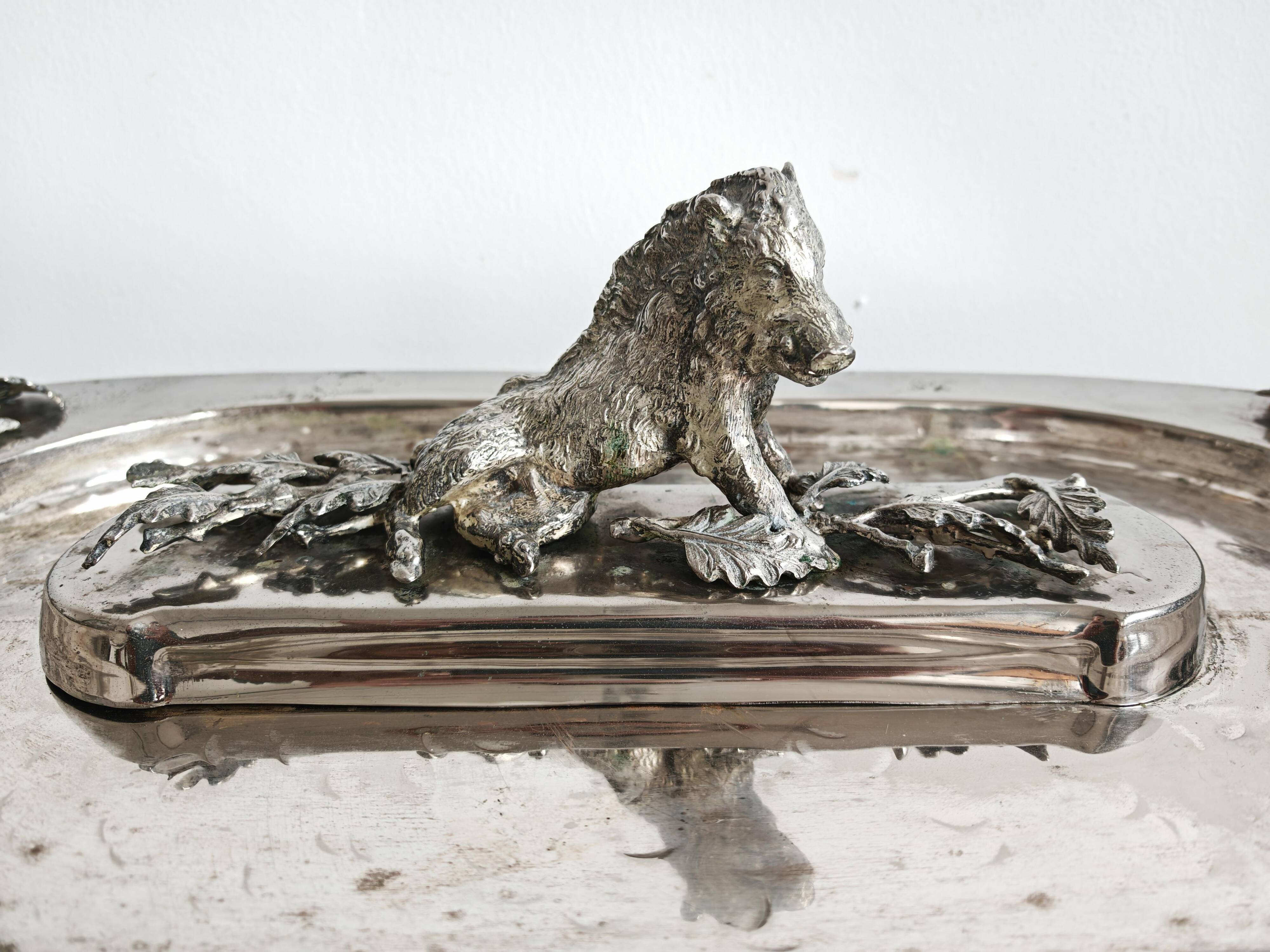 Silver serving dish by Franco Lapini with boar sculpture.