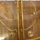Table basse tripartite en laiton et verre