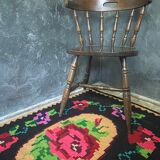Hand-woven wool carpet black background with large roses 214x158cm
