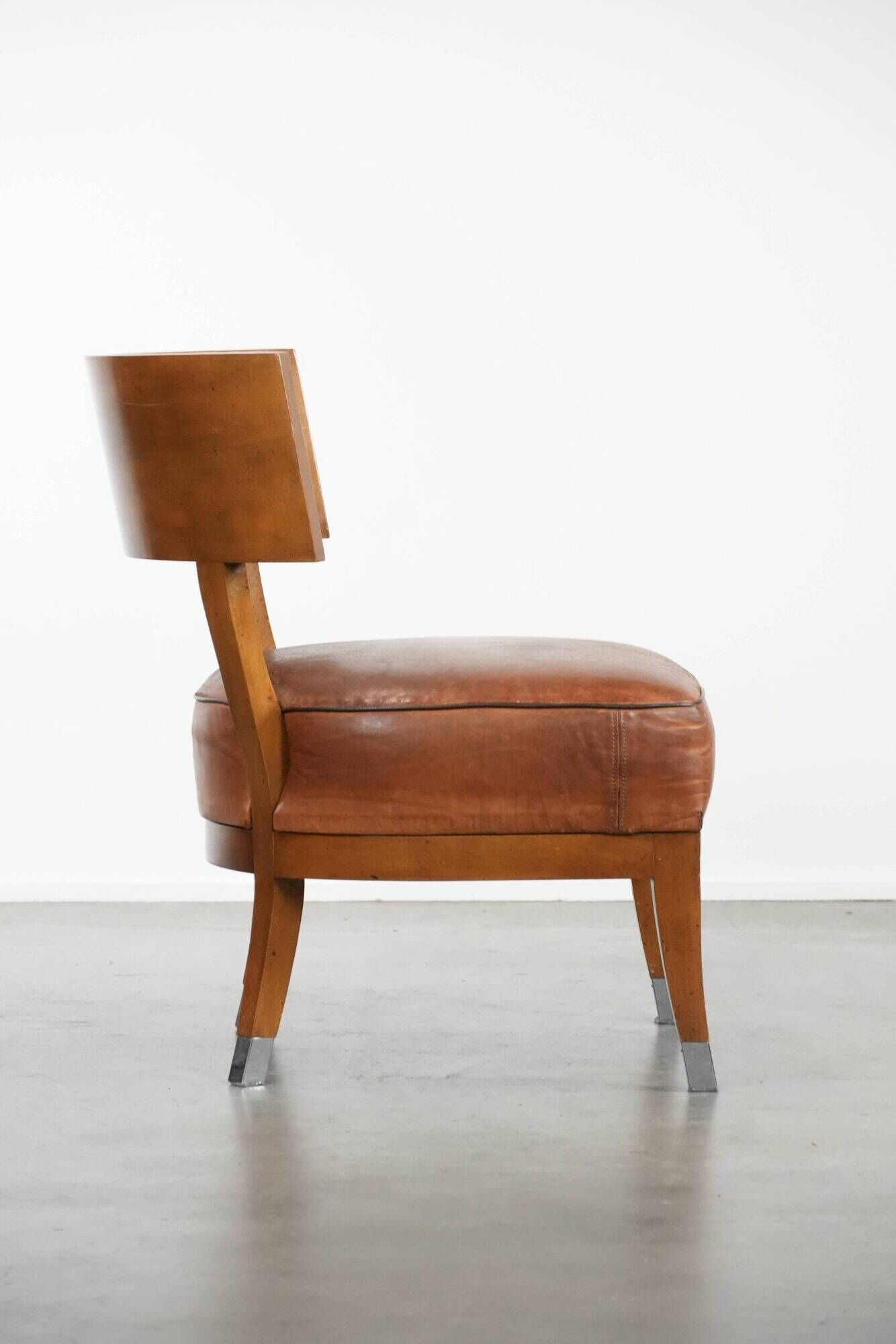 Vintage design armchair / cocktail chair made of sheepskin leather