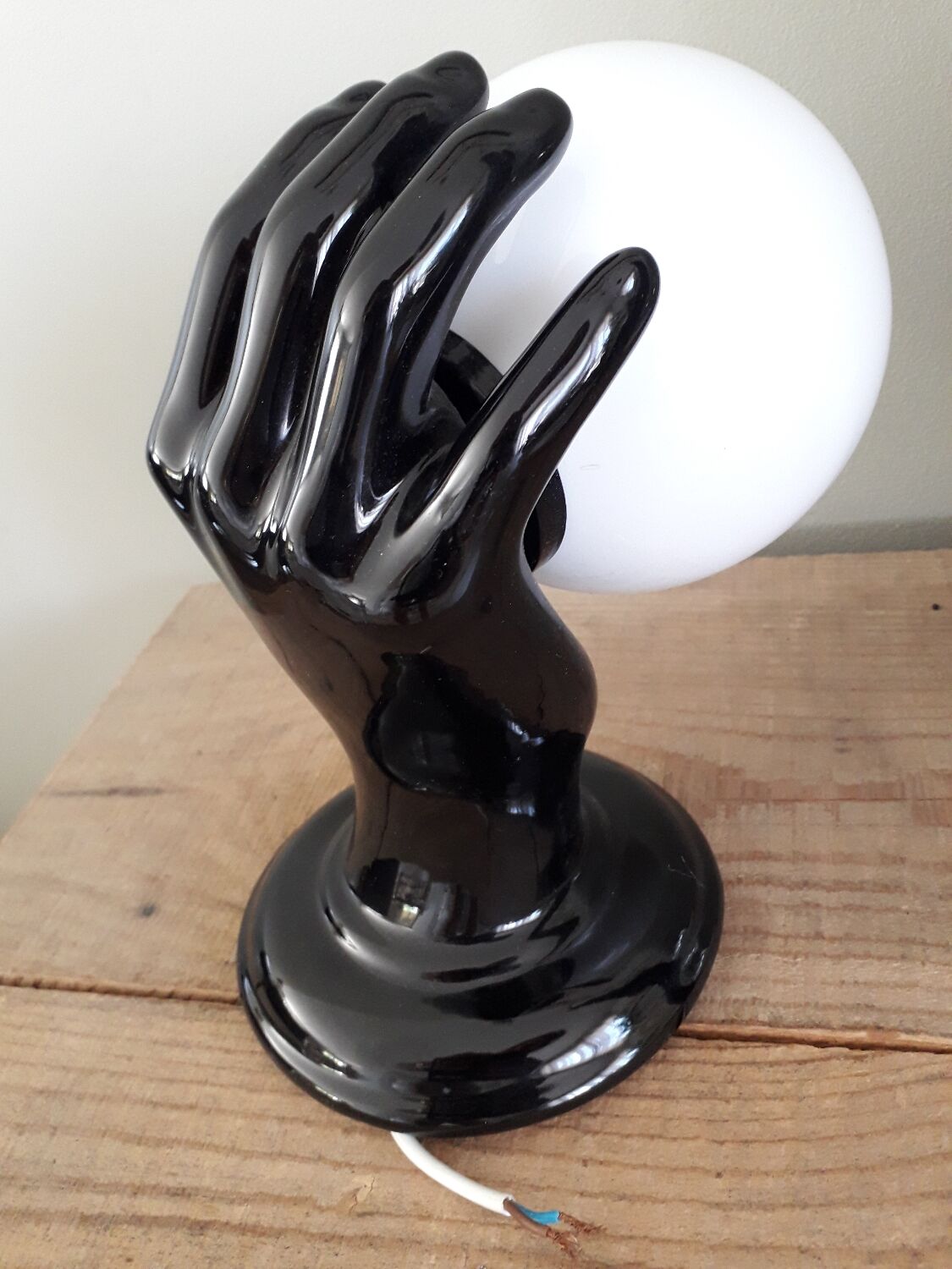 Hand and opaline globe wall light