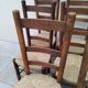 8 vintage straw chairs in the style of Charlotte Perriand.