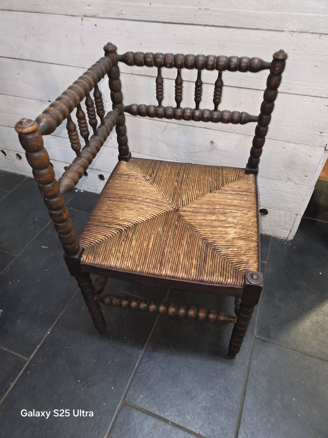 Antique corner fireplace armchair