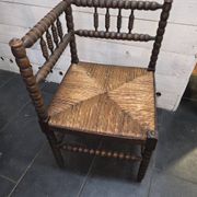 Fauteuil de coin de cheminée ancien