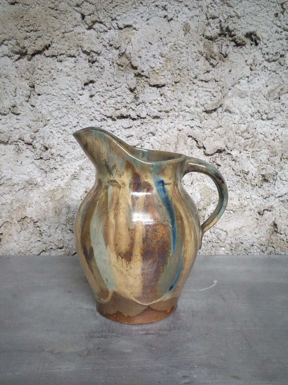 Glazed stoneware pitcher