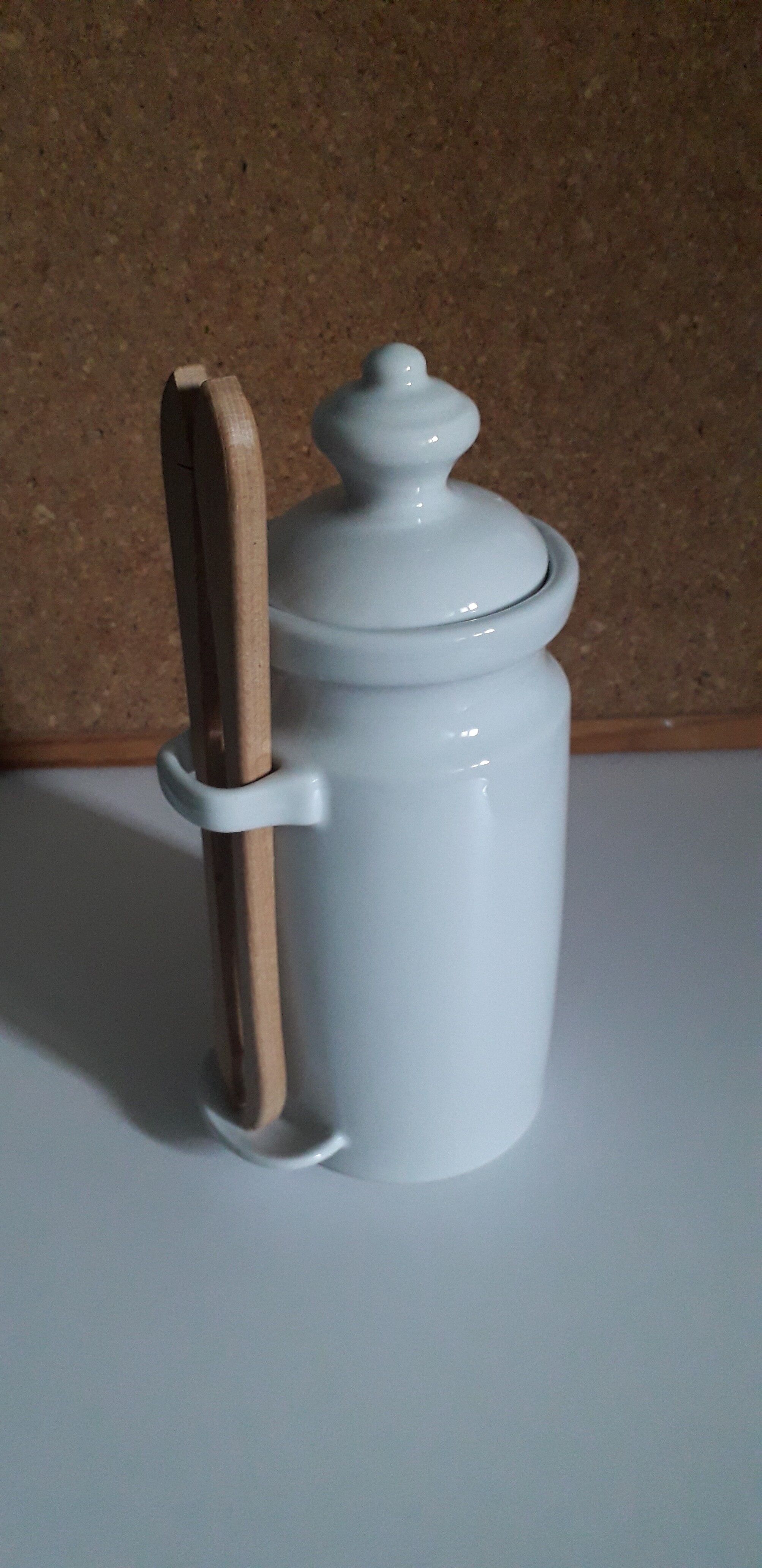 White porcelain pot for storing pickles or fruits with alcohol