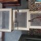 Set of three nesting tables in brass and glass