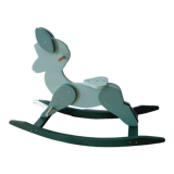 Cheval de bois à bascule