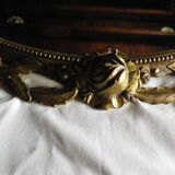 Bronze mirror gilded with roses, 72 cm