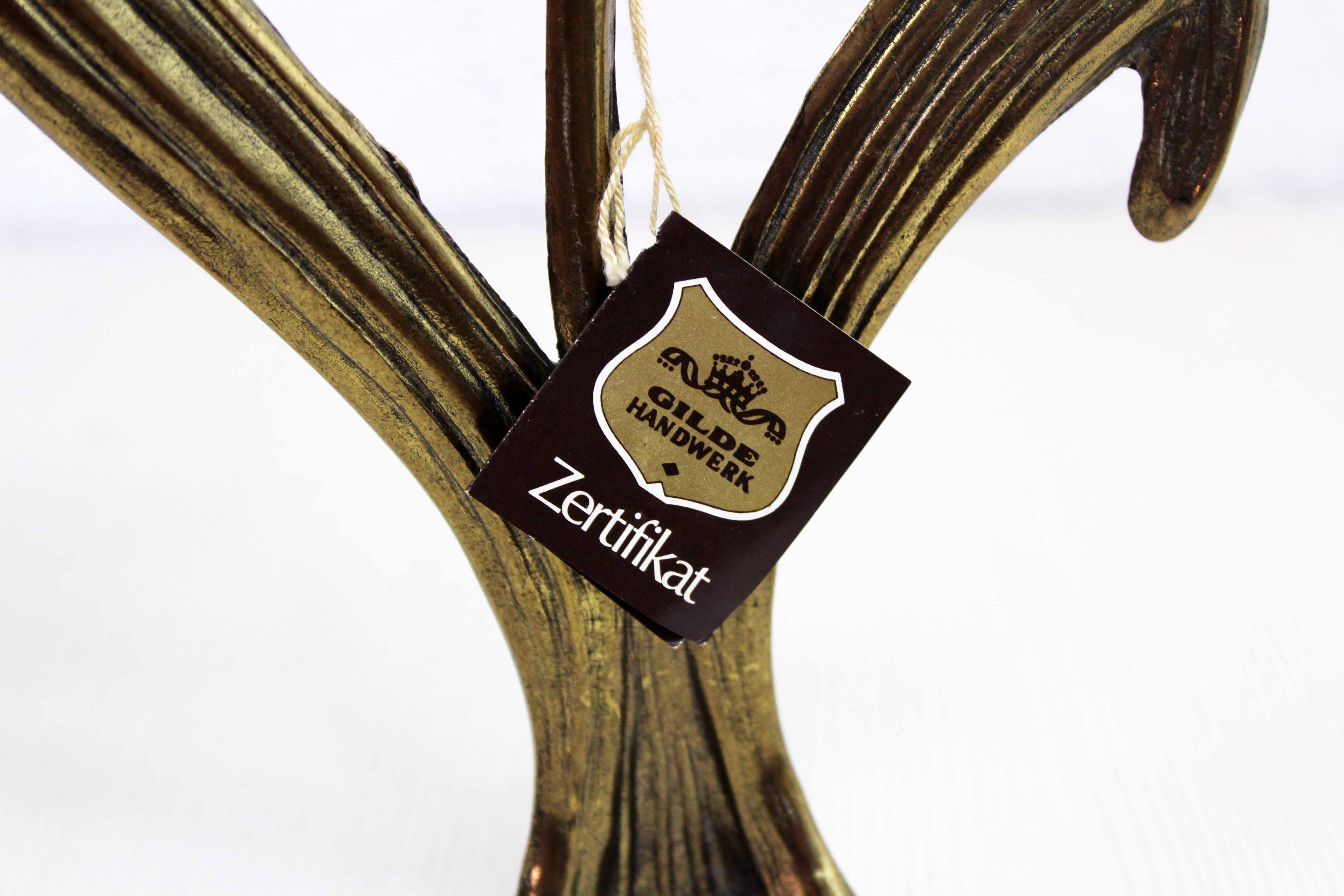 Art Nouveau brass flower candle holder