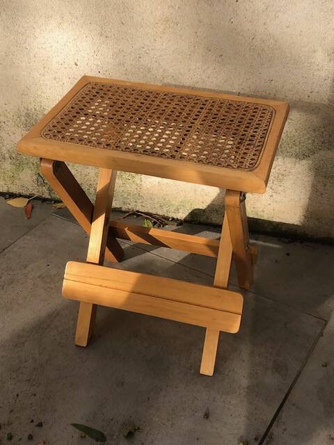 Wooden and cane bedside table