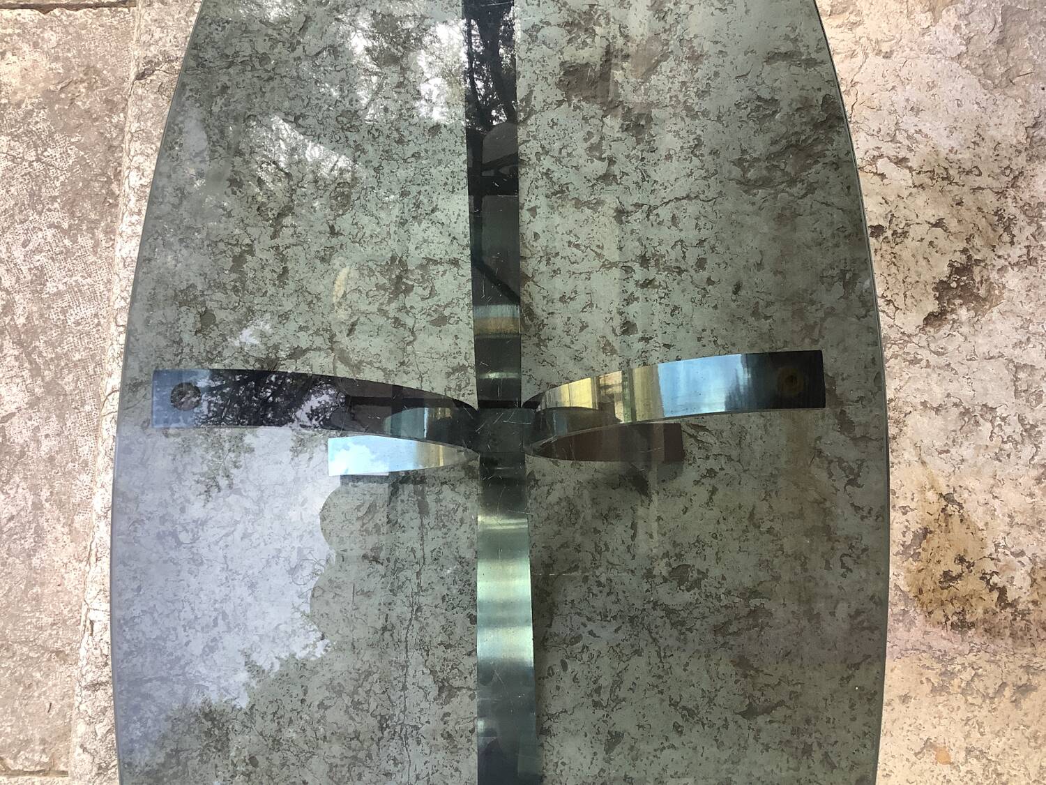 Oval smoked glass coffee table from the 70s