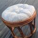 Varnished rattan pouf and cushion