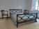 Directoire style mahogany double bed