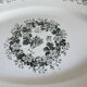 Oval dish with green motorcycles Terre de Fer