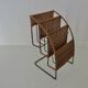Raoul Guys rattan and metal magazine rack from the 50s