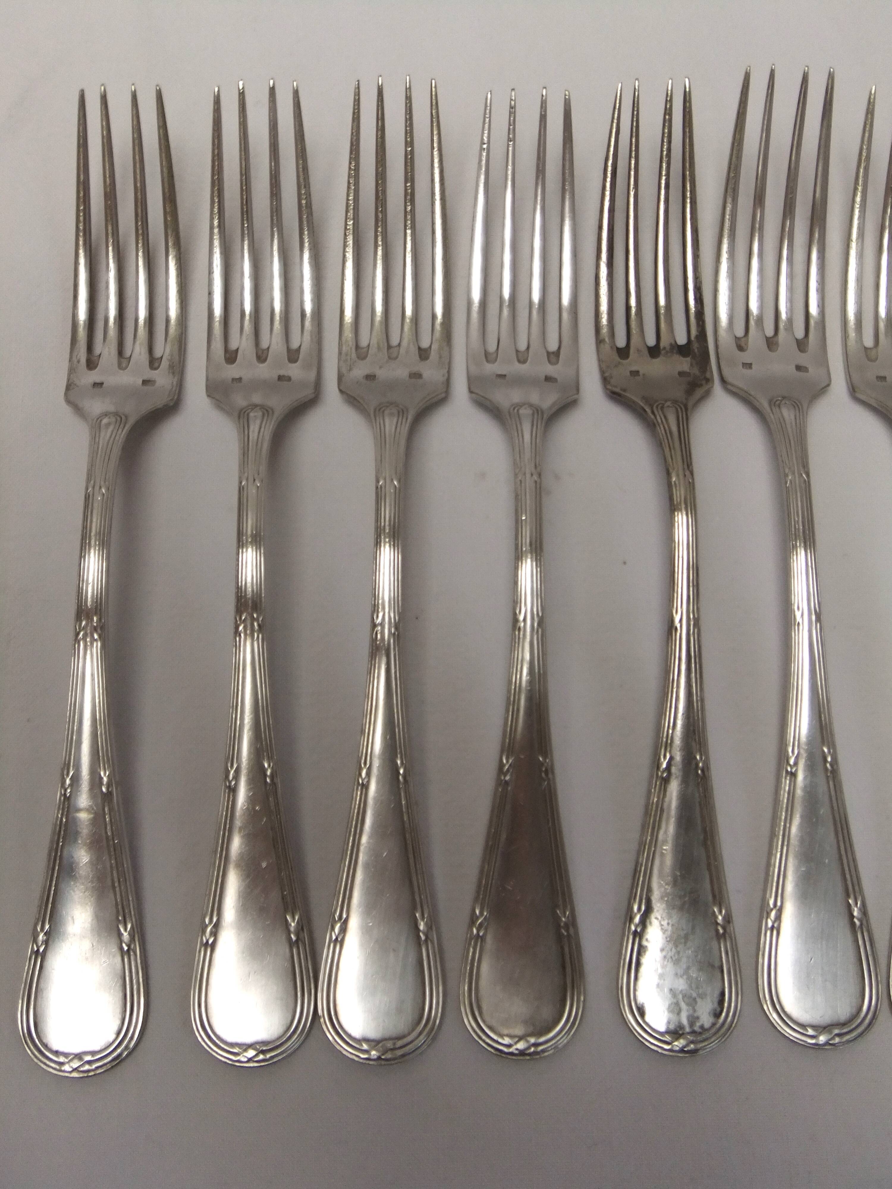 Old Louis XVI service fork with mesh ribbon