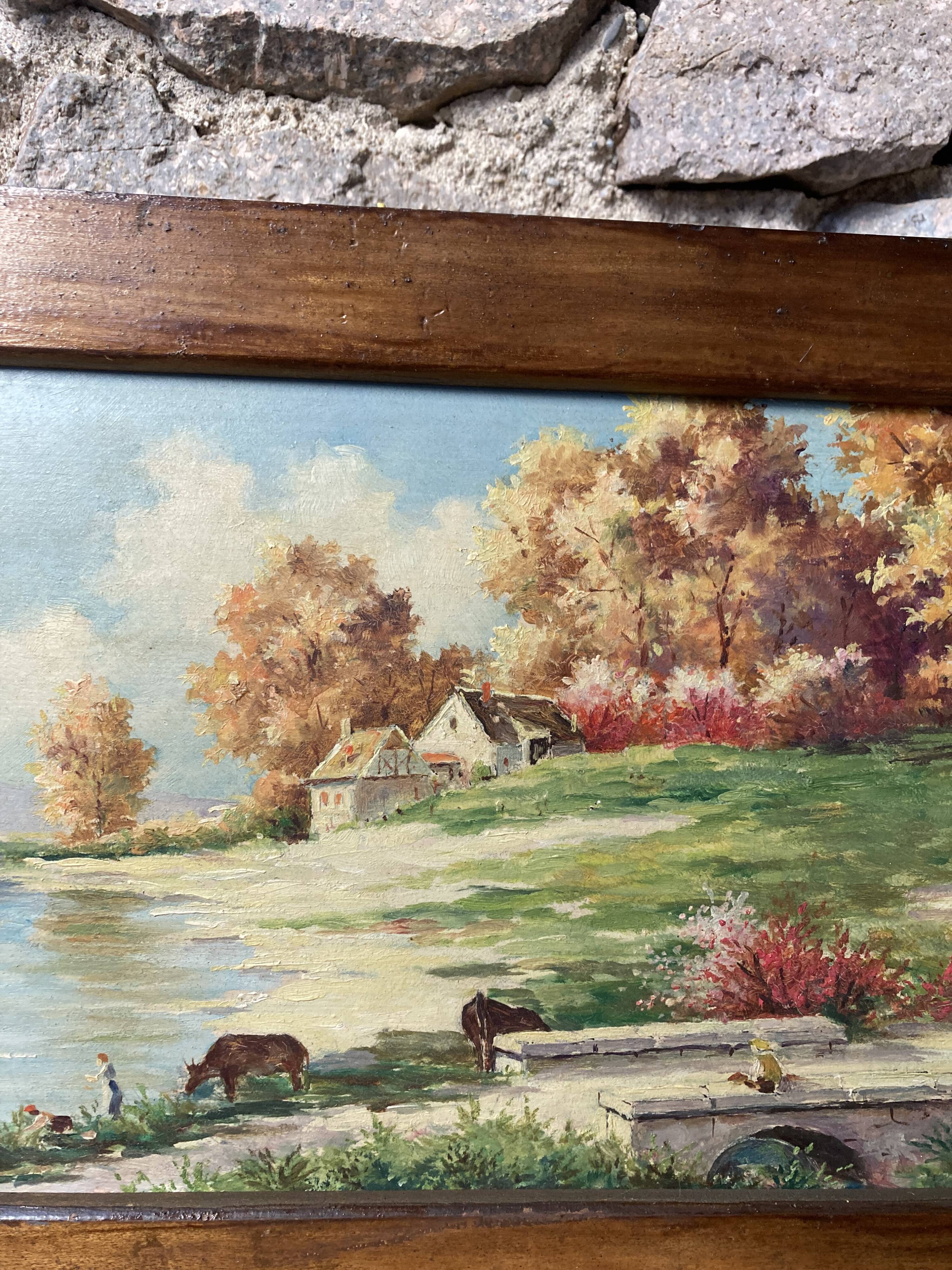 Pair of Art Deco wood and embossed metal landscape frames