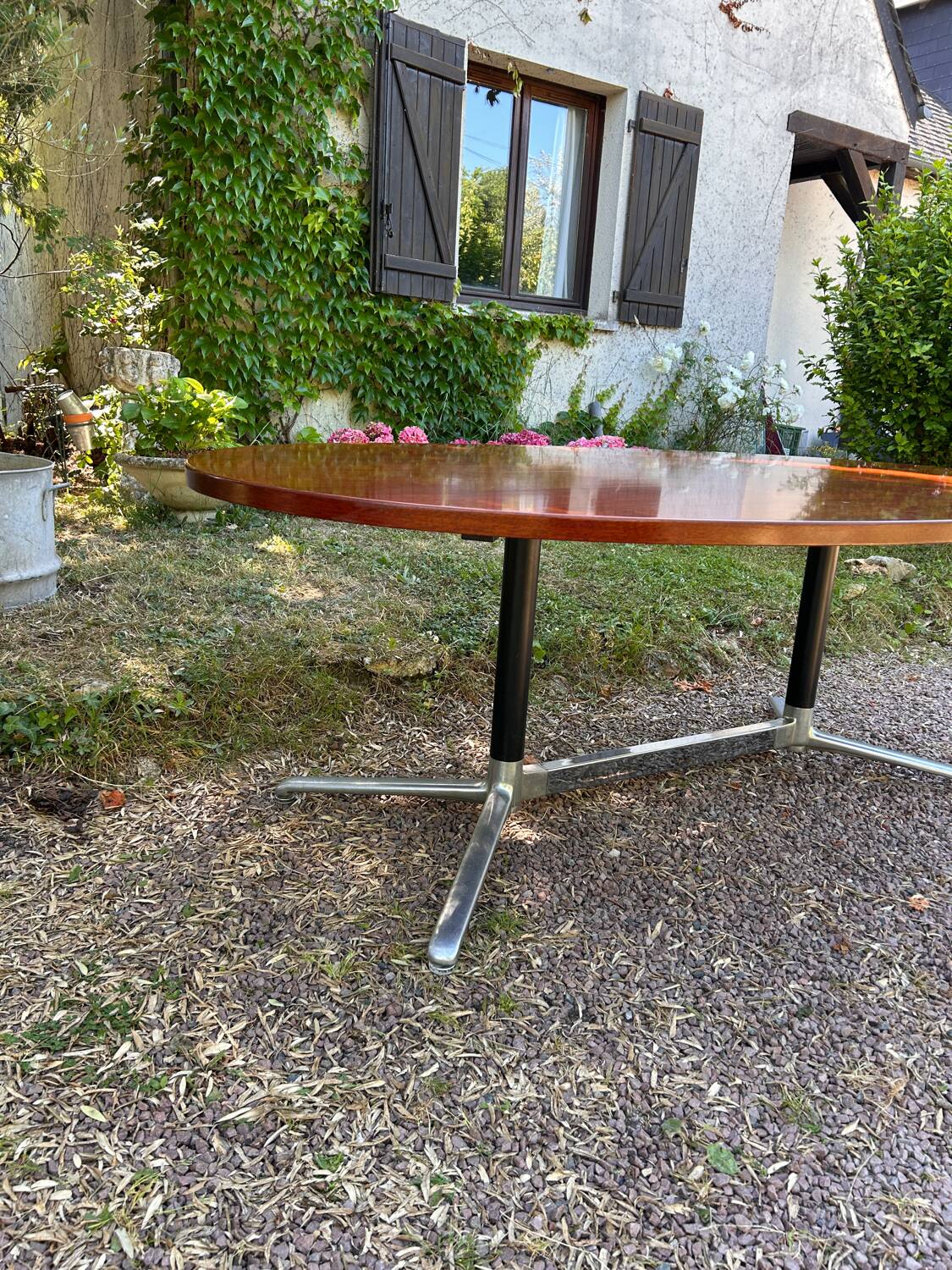 Vintage oval wooden and metal dining table from the 60s and 70s