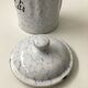 Vintage coffee pot in white enamelled iron and blue retro kitchen decoration