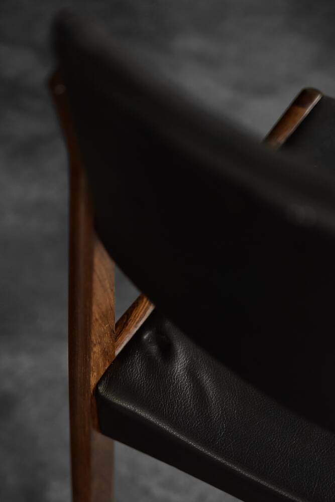 Modern vintage Scandinavian chairs in rosewood and black leather from the mid-century by Bramin, set of 3.