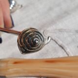 expensive silver metal snail door