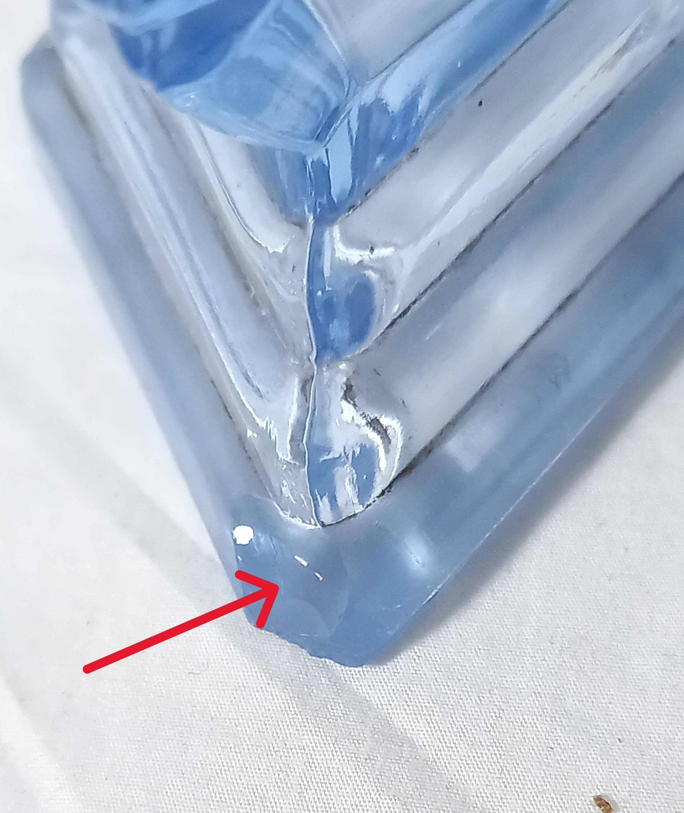 Art deco diamond-shaped vase in light blue color pressed molded glass