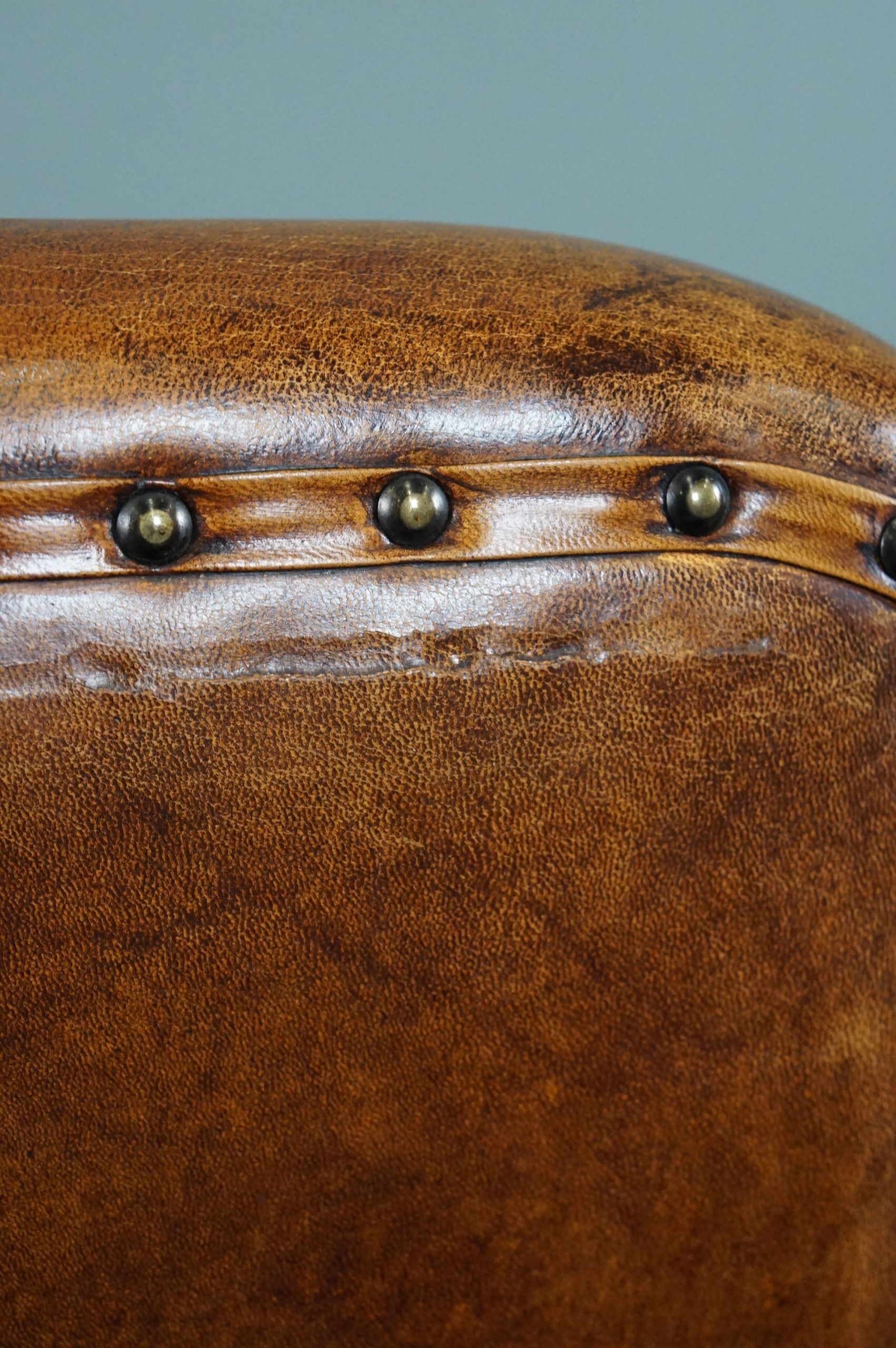 Schapenleren armchair and studio lounge stool