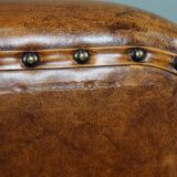 Schapenleren armchair and studio lounge stool