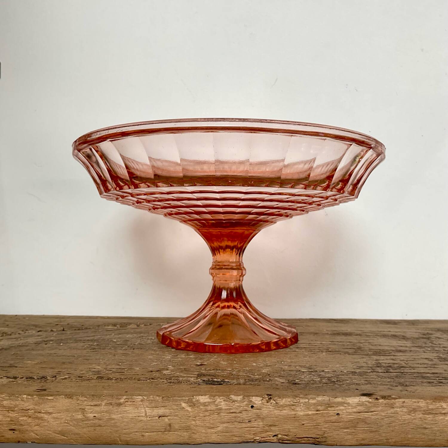 Pink glass cup, fruit bowl